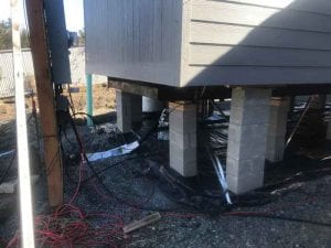Earthquake tie-downs for mobile homes