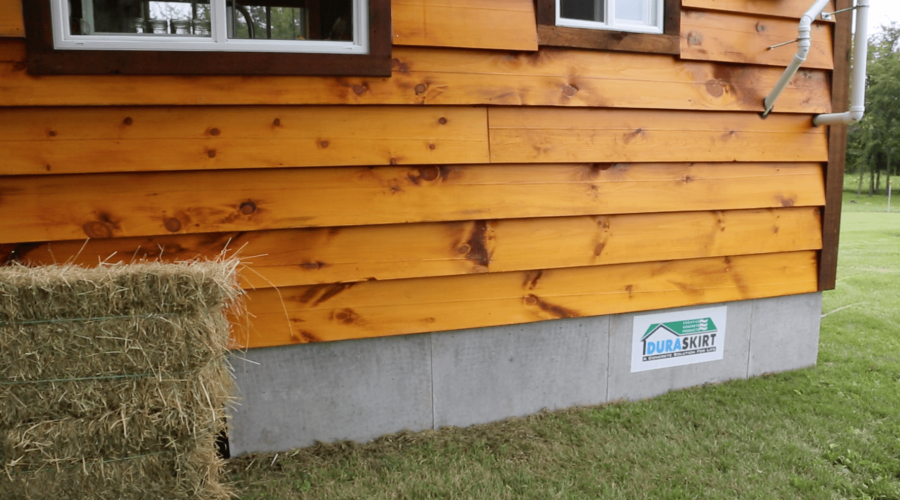 Precast concrete siding DURASHEDSKIRT™